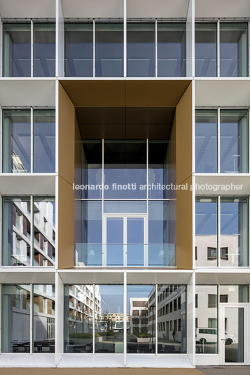 emmi-main office and apartment complex rüssli architekten