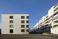 emmi-main office and apartment complex rüssli architekten