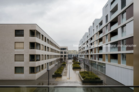 emmi-main office and apartment complex rüssli architekten